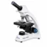 Microscopio monocular Prisma 104-M con iluminación LED y objetivos acromáticos, ideal para escuelas y clínicas pequeñas.